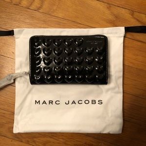 - NWT and dust bag zip phone wristlet/wallet